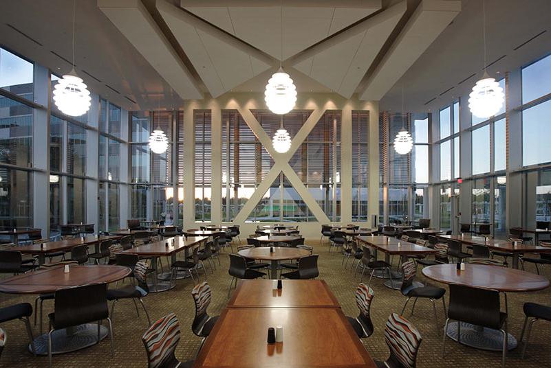 Dining Room with high ceiling and glass walls on all sides